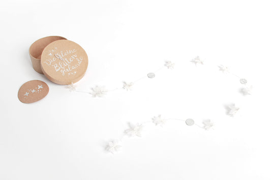 Kleine Girlande in der Dose. Blüten