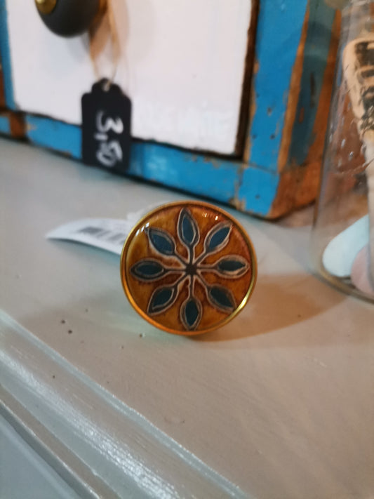 Möbelknopf gold, blaue Blume