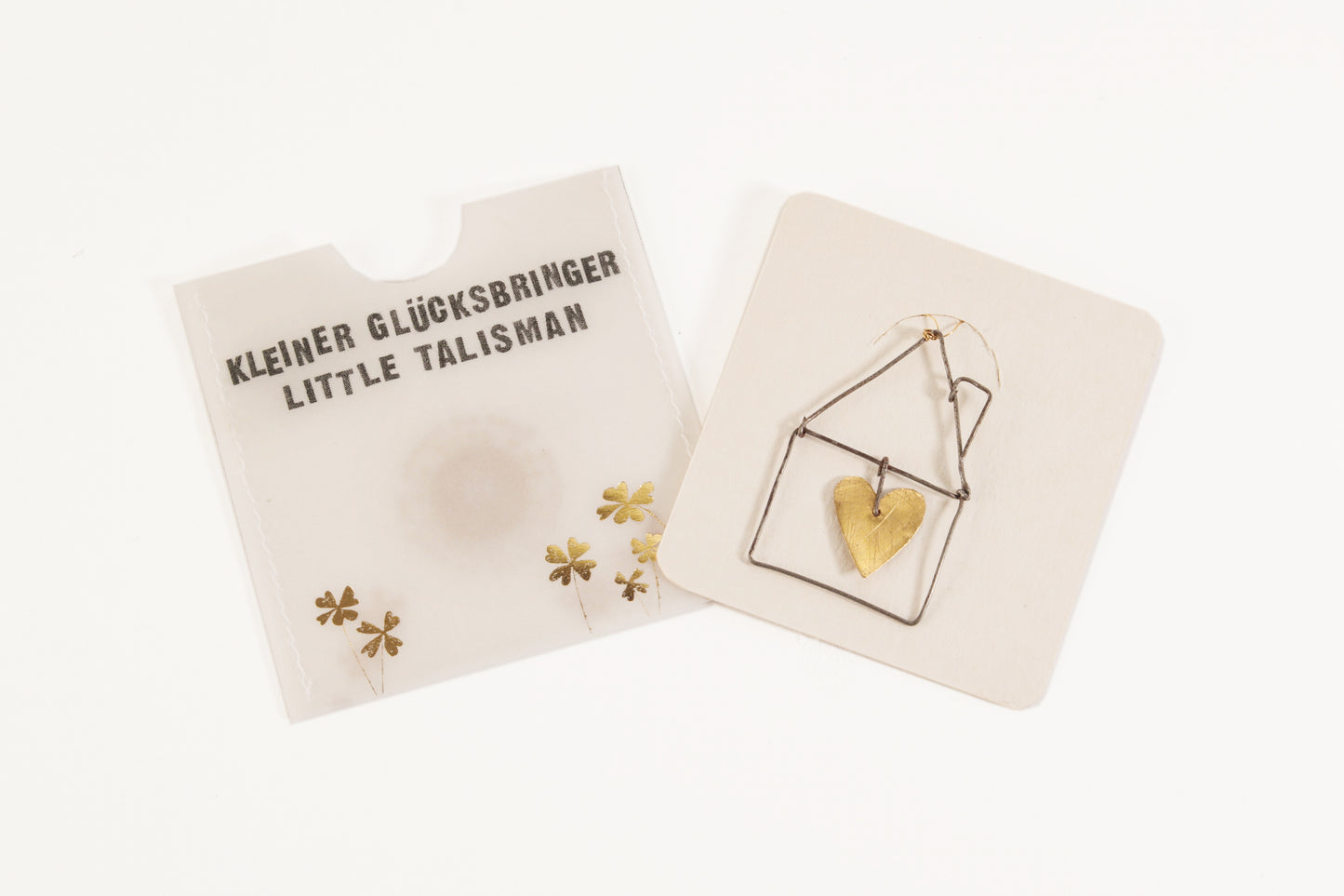 Kleine Goldglücksbringer. Haus