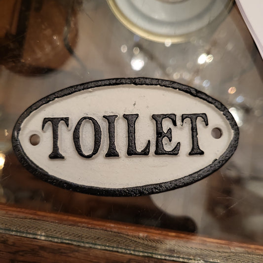 Textschild "Toilet"
