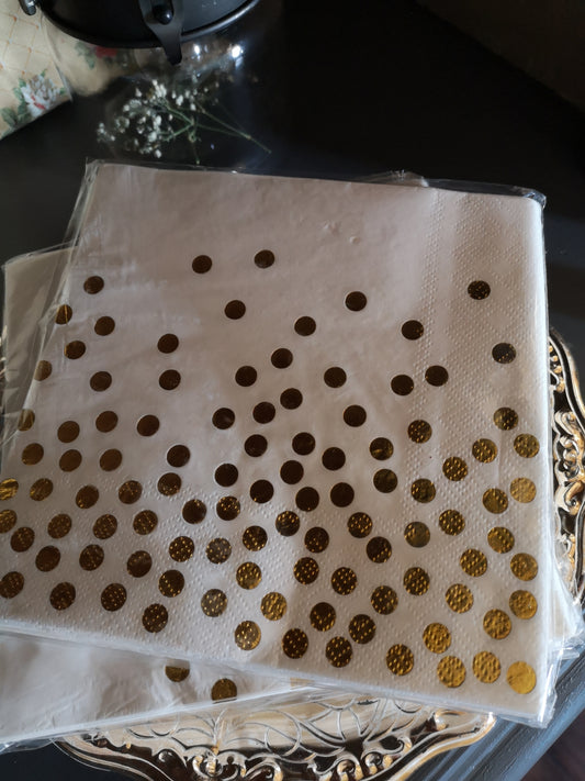 Serviette mit goldenen Punkten